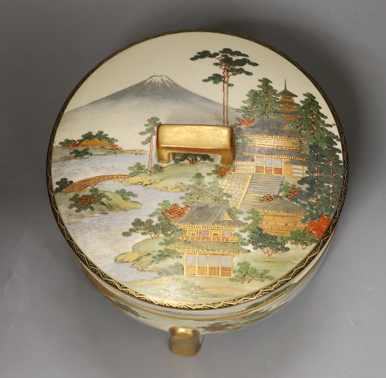 An early 20th century Japanese Satsuma circular box and cover, 18.5cm